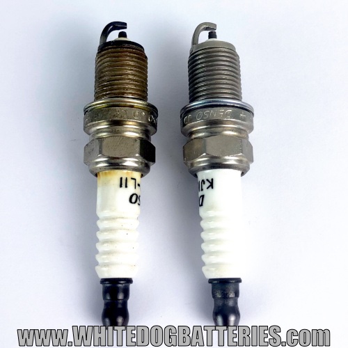 New and used spark plug side by side