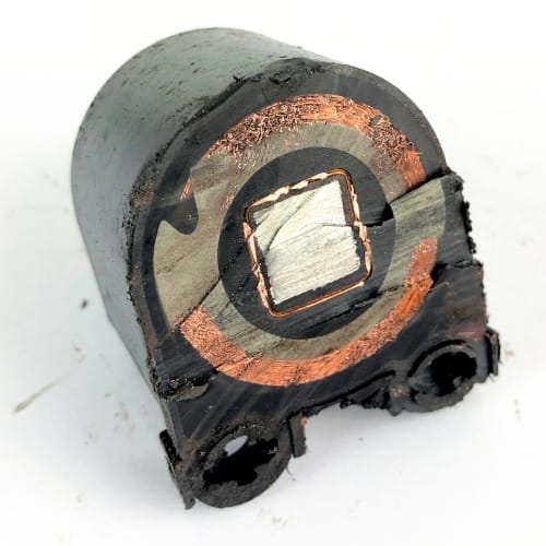 Inside a motorcycle ignition (spark plug) coil…